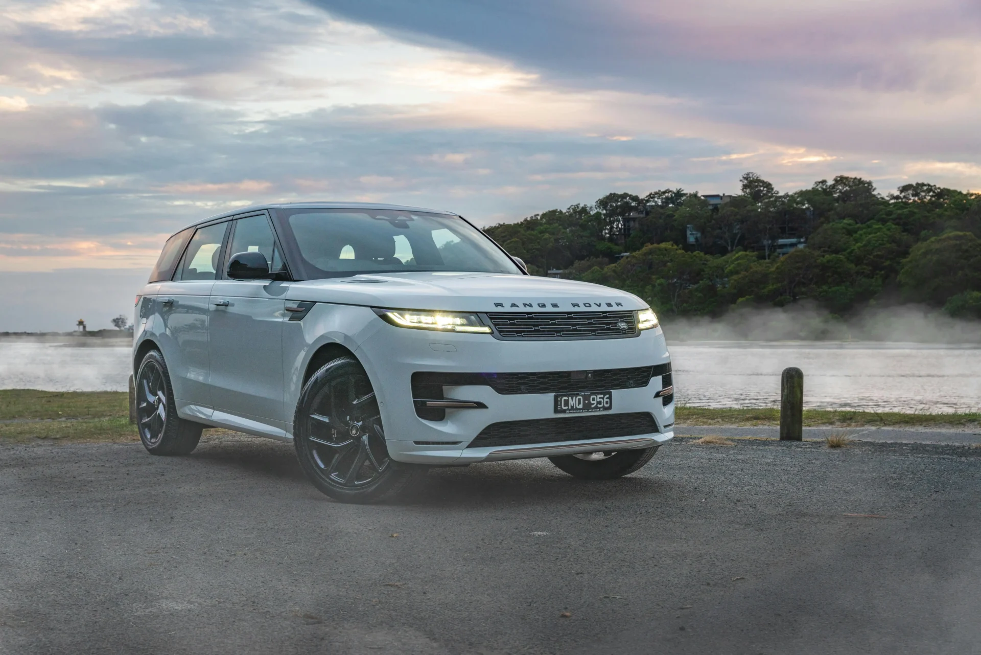 White range rover car parked on the roadside